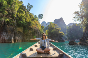 https://www.pexels.com/photo/photo-of-woman-sitting-on-boat-spreading-her-arms-1371360/